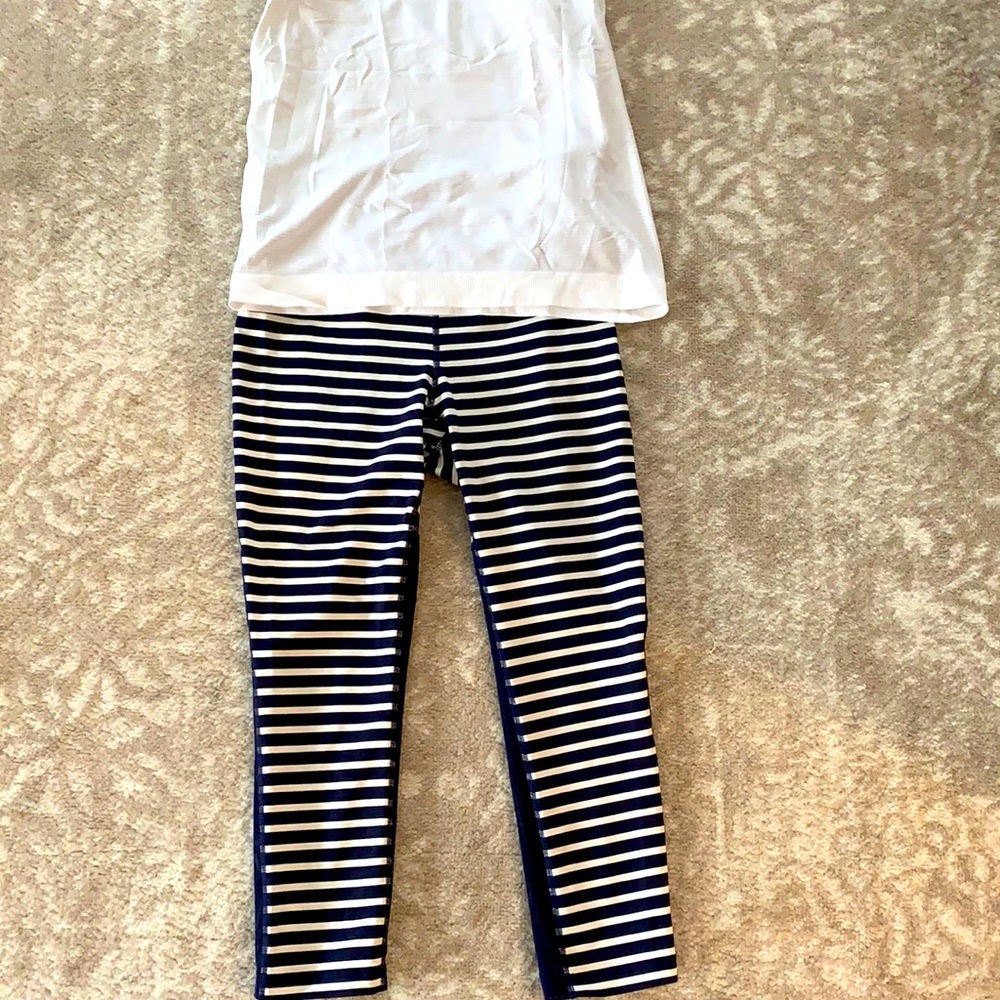 New Balance navy striped leggings with mesh fabric